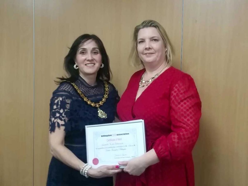 Deputy Mayor of Hillingdon presenting Kate Patterson the award