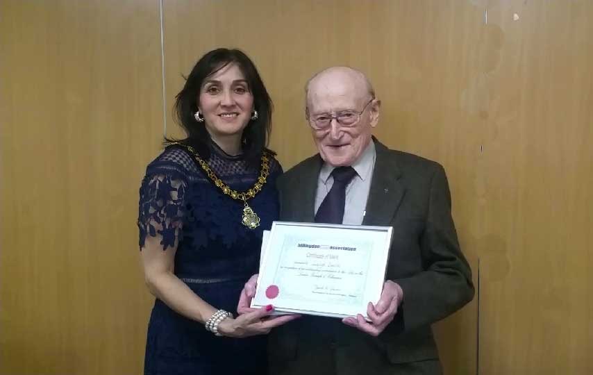 Deputy Mayor of Hillingdon presenting Leigh Smith the award